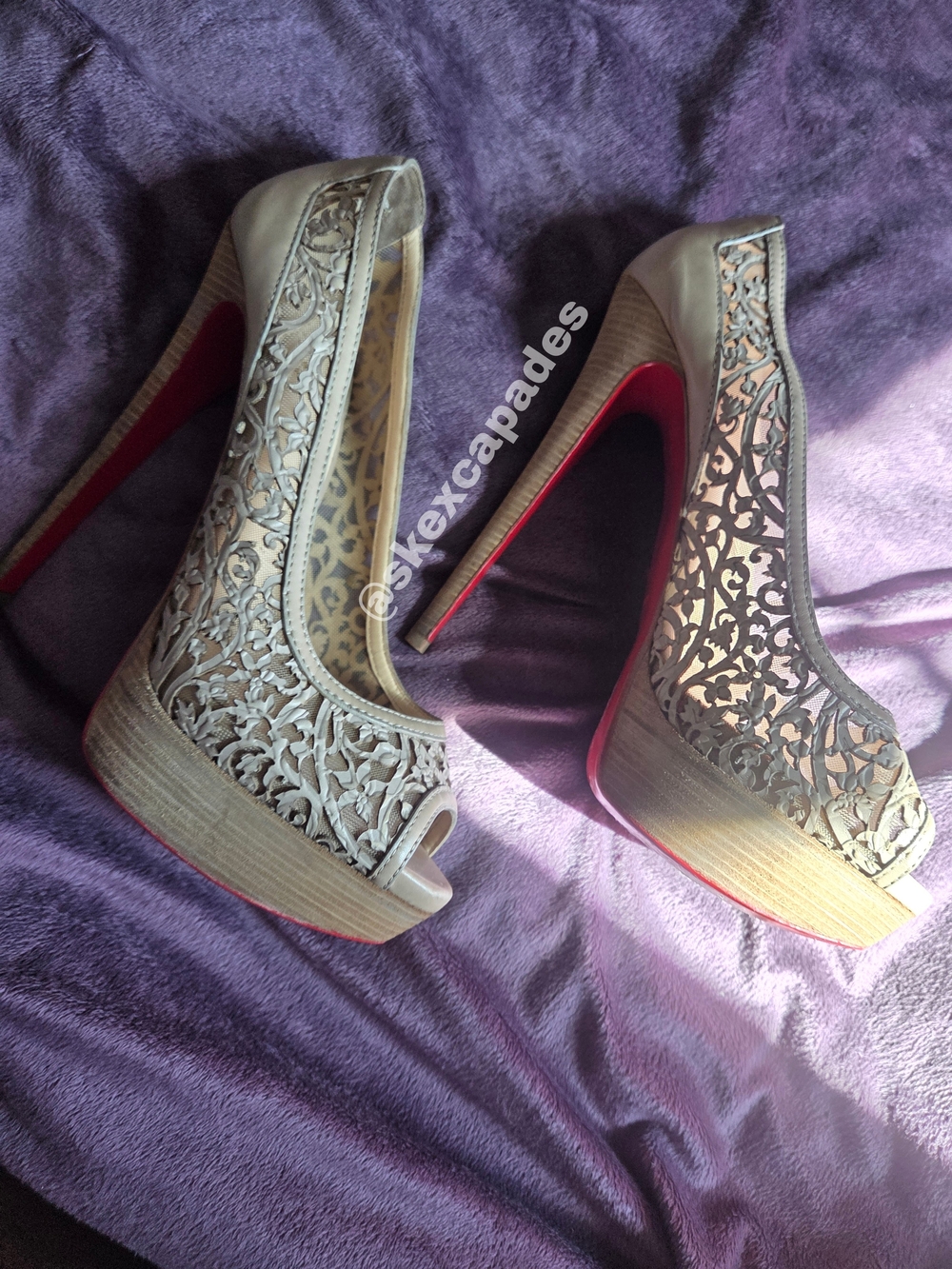 Christian Louboutin Beautiful Embossed Leather Floral Cut Out Design